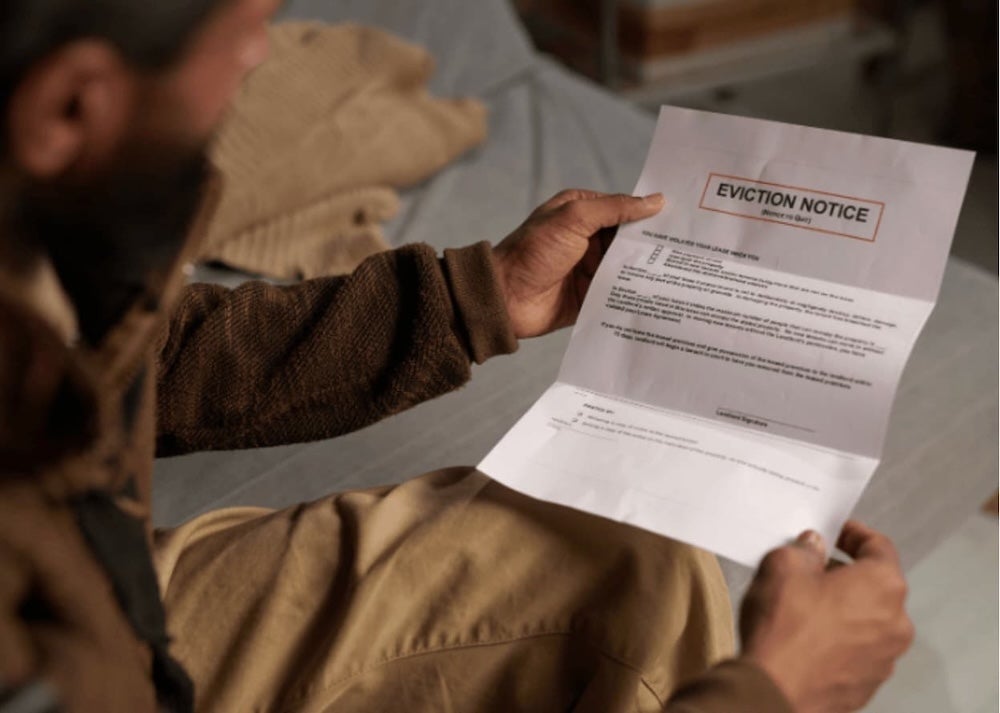 Someone reading an eviction notice