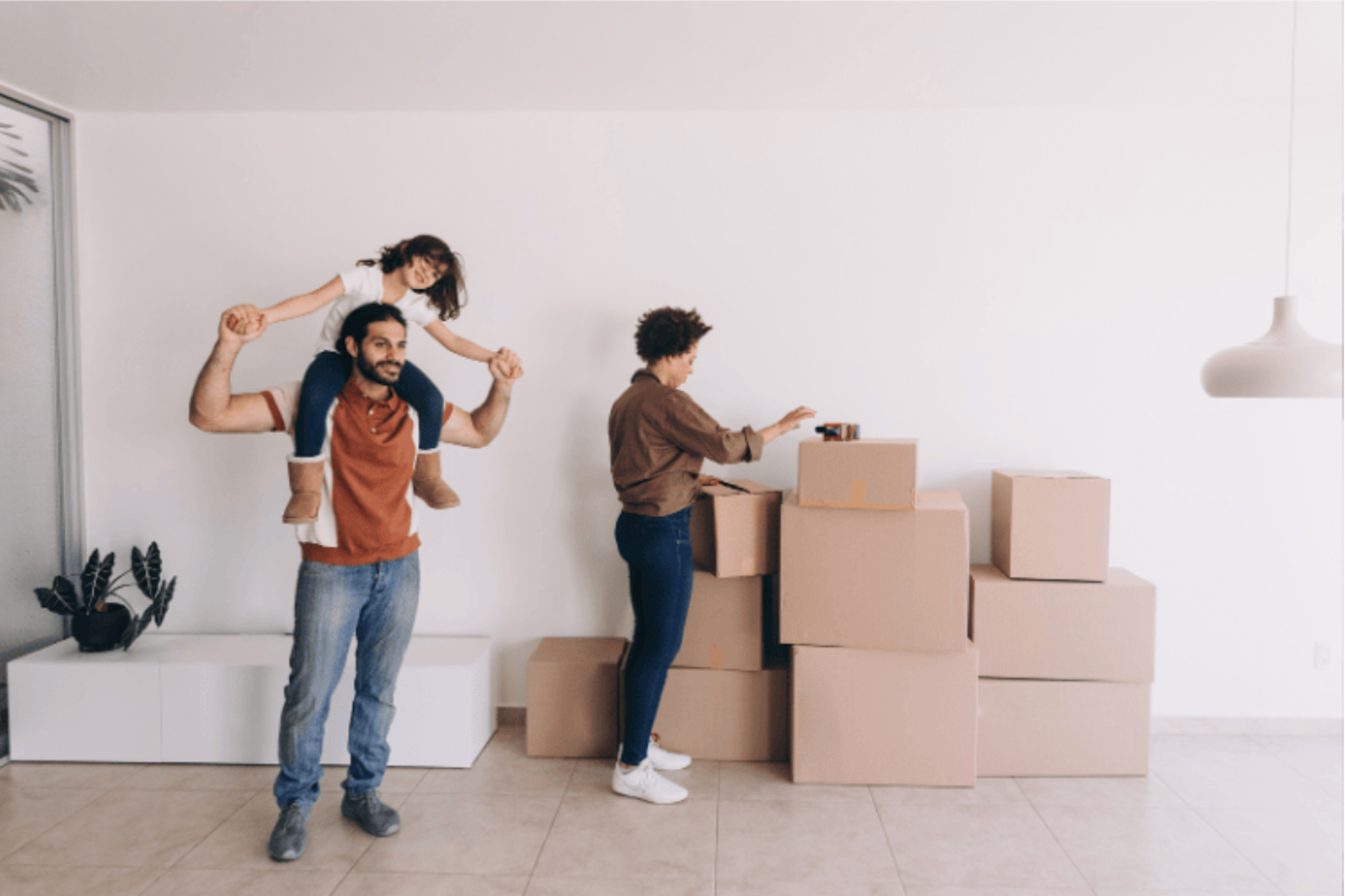 A family unpacking boxes