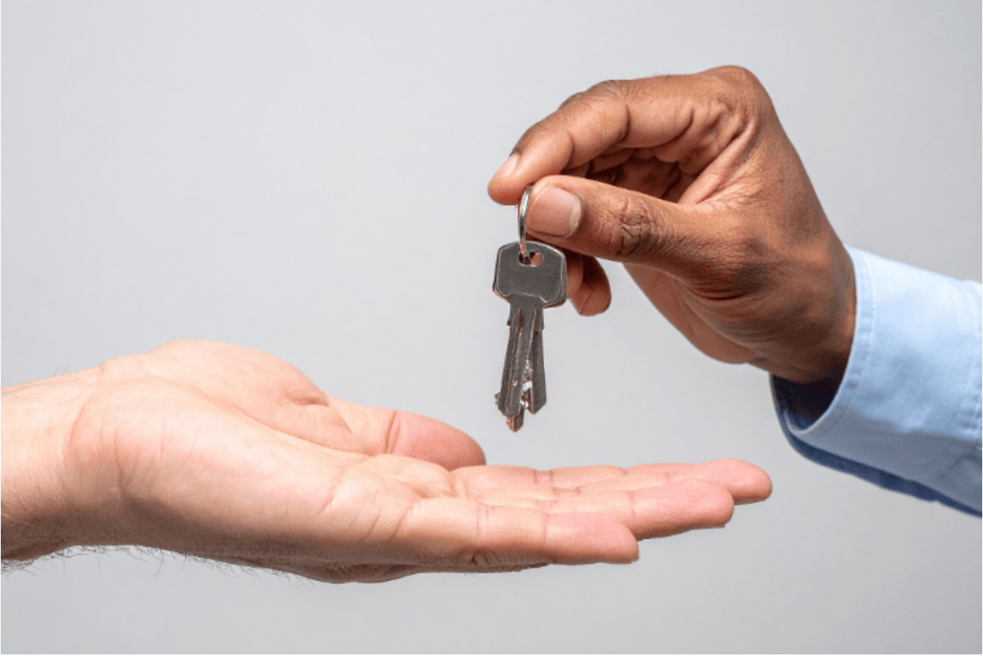 Someone handing over keys