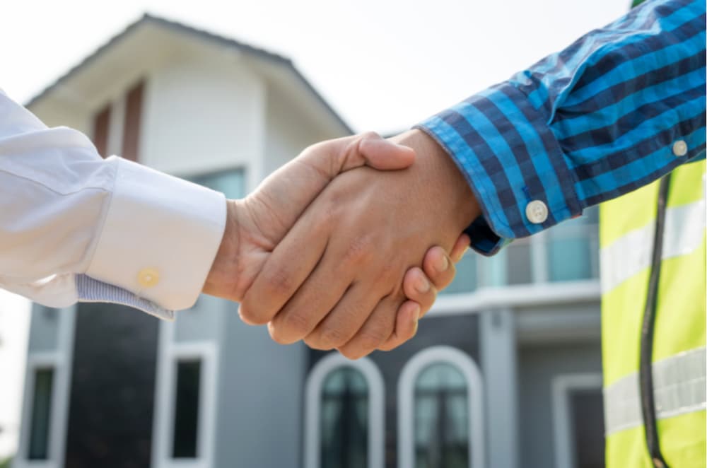 An image of two people shaking hands