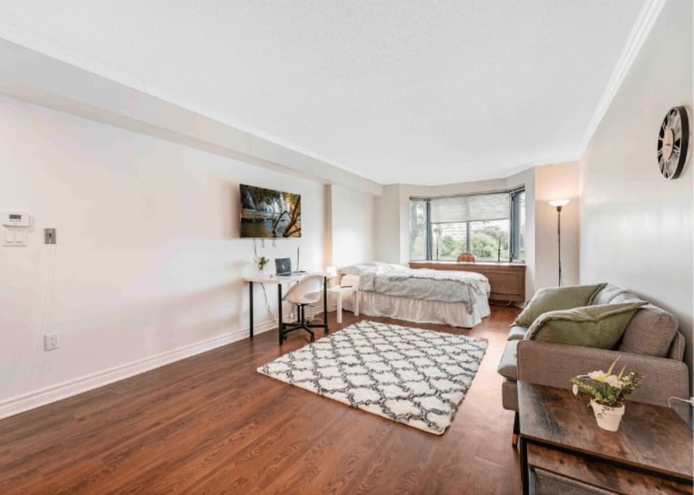 An image of a sparcely decorated living room