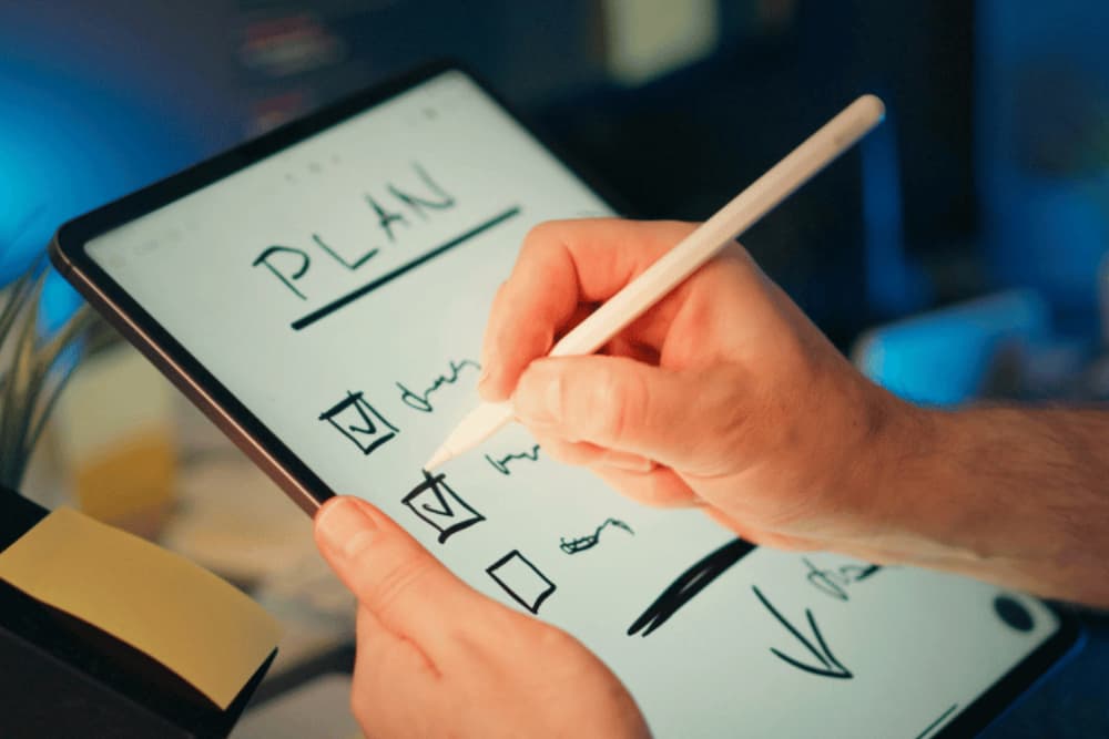 A tablet device with a checklist plan on it