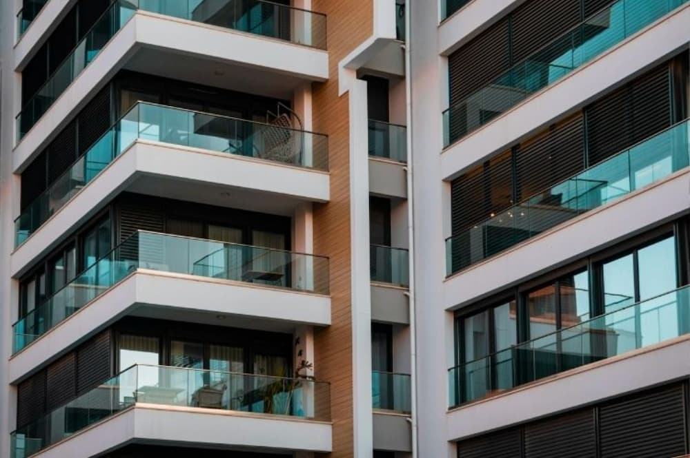 A close up image of balconies outside an aprtment building
