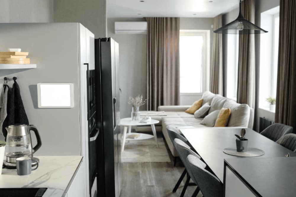 An image of a tidy kitchen and living room
