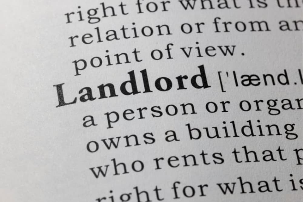 An image of a dictionary with landlord highlighted with the meaning